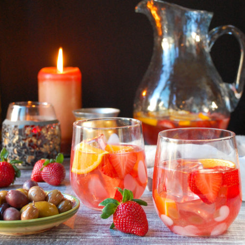 https://mealsheelsandcocktails.com/wp-content/uploads/2021/12/Skinnygirl-Strawberry-Rose-Sangria-4-500x500.jpg